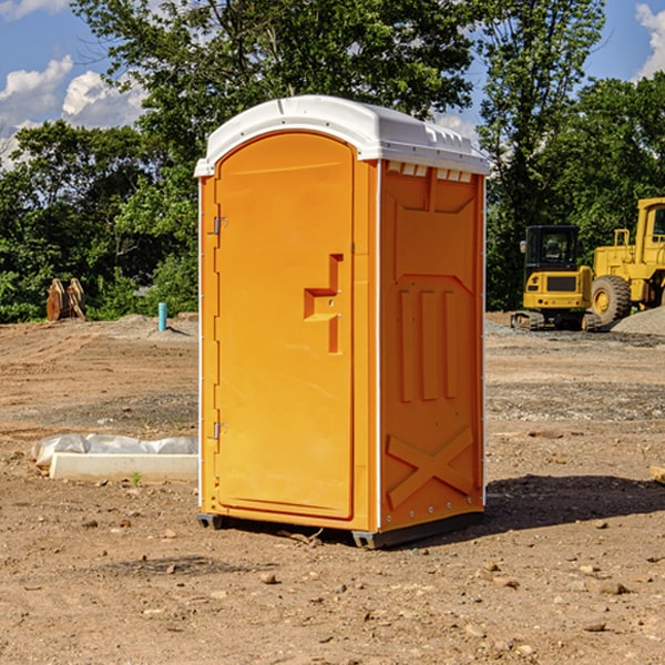 how often are the portable restrooms cleaned and serviced during a rental period in Old Field